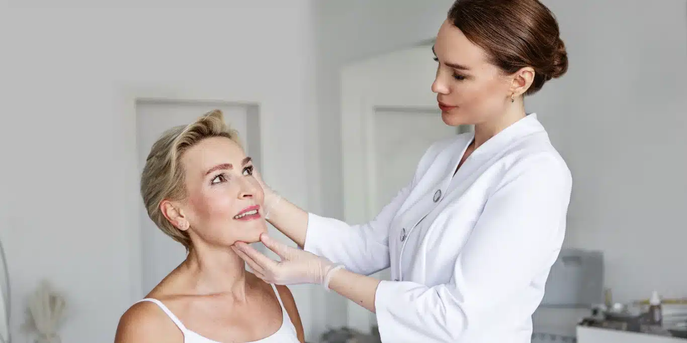 cosmetologist client face examination